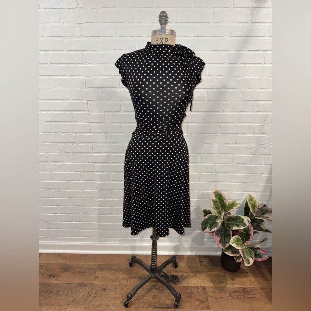 Retrolicious Black and White Polka Dot Midi Dress with Bow Detail at Neckline